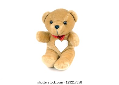 small teddy bear with heart on chest