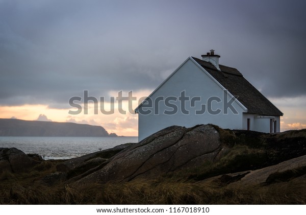 Small Thatched Cottage On Wild Atlantic Stock Photo Edit Now