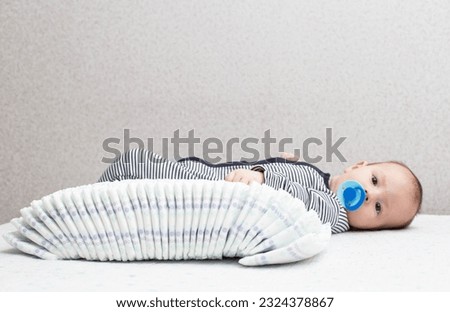 Similar – Baby asleep while parents caress