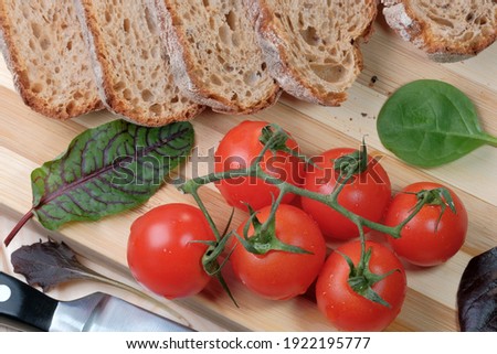 Similar – Image, Stock Photo Bruschetta with cream cheese, cherry tomatoes and basil