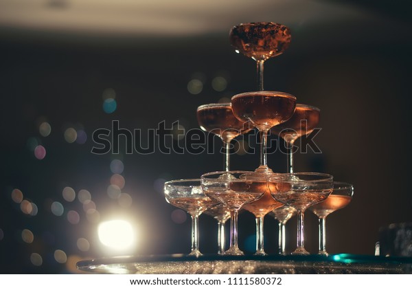 small tower of champagne\'s glass in wedding\
reception party
