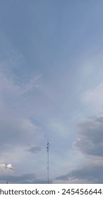 small tower with overcast cloudy background 