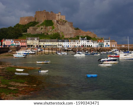 Similar – Image, Stock Photo Waterfront with small fishing boats in Spain Cadiz