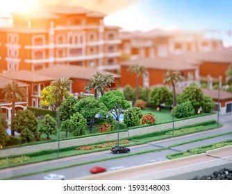 Small Town Model. Toy City Miniature Background. Toy Buildings And Road. Ecology Project, Construction Of Residential Complex. Design Template