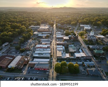 Small Town Parade At Sunset