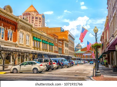 Small Town Quaint USA Main Street Hometown Commercial Storefront Shops With Flag In Downtown Roanoke Virginia