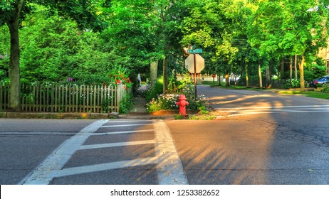 Small Town Residential Neighborhood Street Corner On A Sunny Summer Evening During The Golden Hour In Chagrin Falls