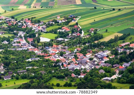A small town surrounded by fields in Austria
