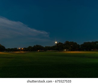 A Small Town In Texas Under The Full Moon.