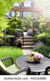 Small townhouse perennial summer garden. Also available in horizontal.