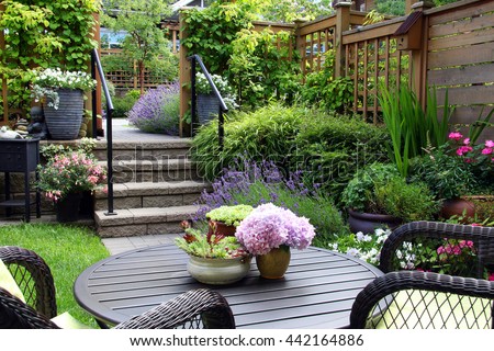 Small townhouse perennial summer garden. Also available in vertical. 