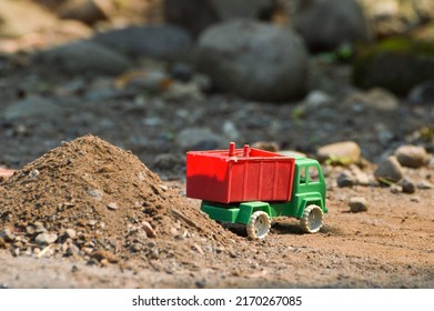 Small Toy Truck On The Ground.