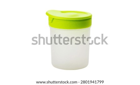 Small translucent plastic food storage container with bright green lid