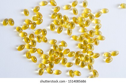 Small Transparent Capsules With Yellow Gel