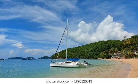 A Small Trimaran By The Sea