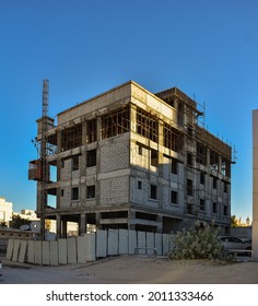 Small Under Construction Building With Exterior Industrial Lift