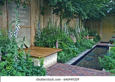 A Small Urban Courtyard Garden With A Water Feature 