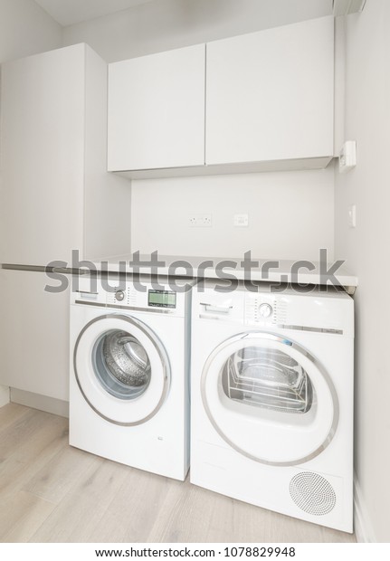 Small Utility Room Cabinets Washing Machines Stock Photo