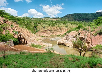 Small Valley With Mountain River And Hut. Shot In Natal Province, South Africa. 