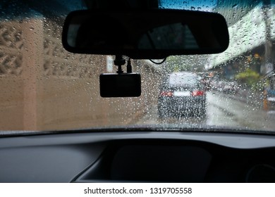 Small Video Camera Record Inside Motor Vehicle On Windshield, Drive Car Road Trips In Rainny Day Weather