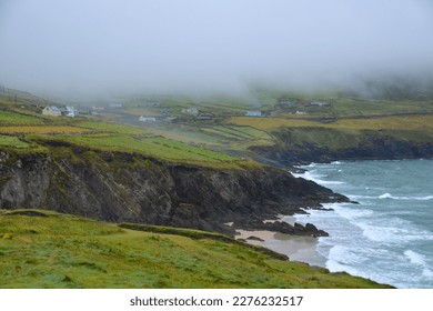 A small village near the dramatic coastline and beach of Coumeenoole in Co Kerry Ireland - Powered by Shutterstock