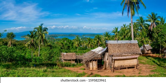 A Small Village On A Beautiful Tropical Island, With The Traditional Thatched Houses Built By Indigenous Mangyan People, Who Live In Mountainous Areas Of Mindoro Island In The Philippines.