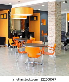 Small Waiting Area Tables Inside Modern Office Space