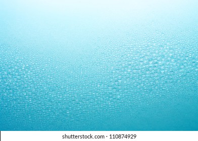 Small water drops arranging in the form of wave.