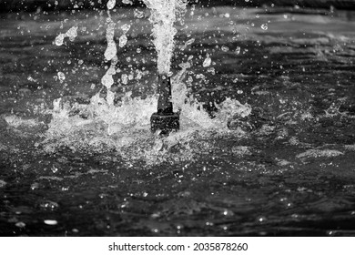Small water fountain gushing upwards