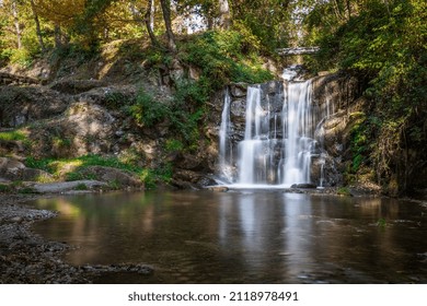 Small waterfall by a river in a forest in the south of France