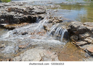 A Small Waterfall At The Falls In Joplin, MO.