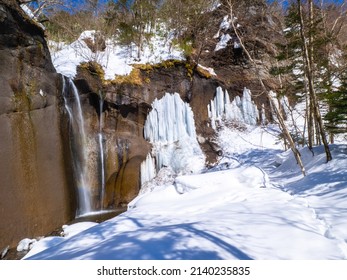 Small Waterfall And Icefalls In A Snowy Forest (Shiraoi, Hokkaido, Japan)