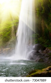 Small Waterfall In Jungles With Sun