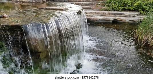 Small Waterfall In Stream In The Woodlands Texas