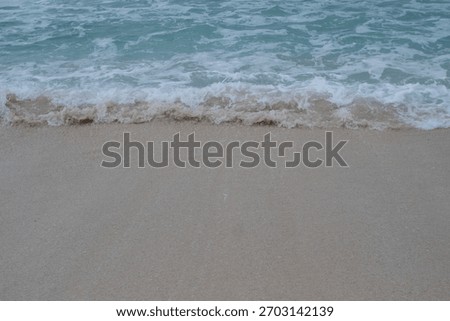 small wavelets with clear sand