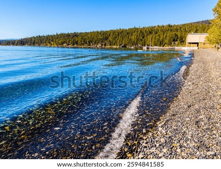 Small Waves Over Pebble Covered Patton Beach on Carnelion Bay, Lake Tahoe, California, USA