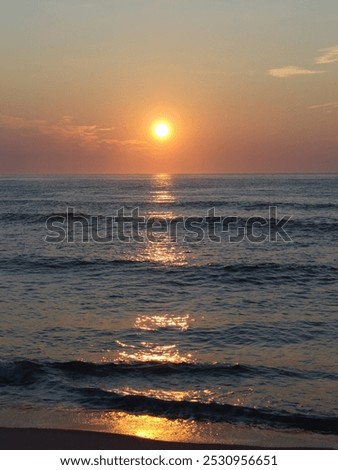 Small waves with sun rising 