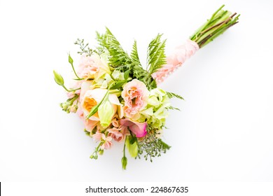 Small Wedding Bouquet With Roses On A White Background.