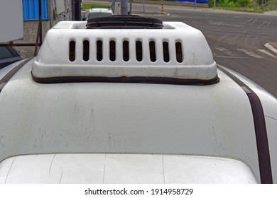 Small White Aerodynamic Cooling Box At Car Roof