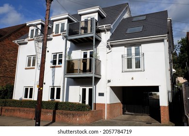 Small White Apartment Building In The Village Of Chorleywood, Hertfordshire