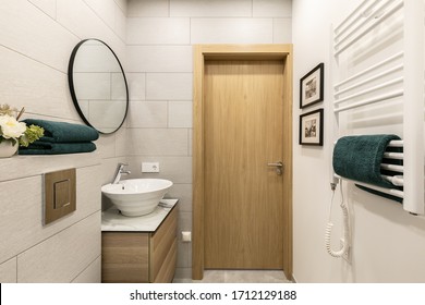 Small White Bathroom Interior With White Appliances 