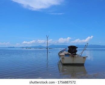 small white boat in the sea ,beautiful blue sky