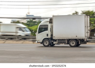 Small White Truck For Logistics Running On The Road, Motion Image, Logistics Service Concept