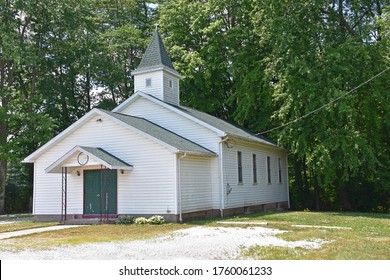 small white wooden church in the country - Powered by Shutterstock