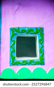 a small window in mud wall in leh town near thiskey monastery, india