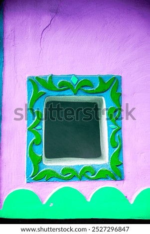 a small window in mud wall in leh town near thiskey monastery, india