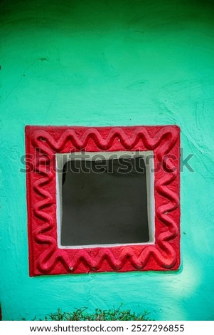 a small window in mud wall in leh town near thiskey monastery, india