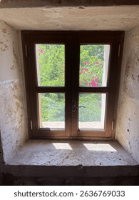 Small window in this stone wall