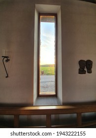 Small Window with view to a sunset