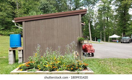 Small Wood Storage And Rainwater Tank